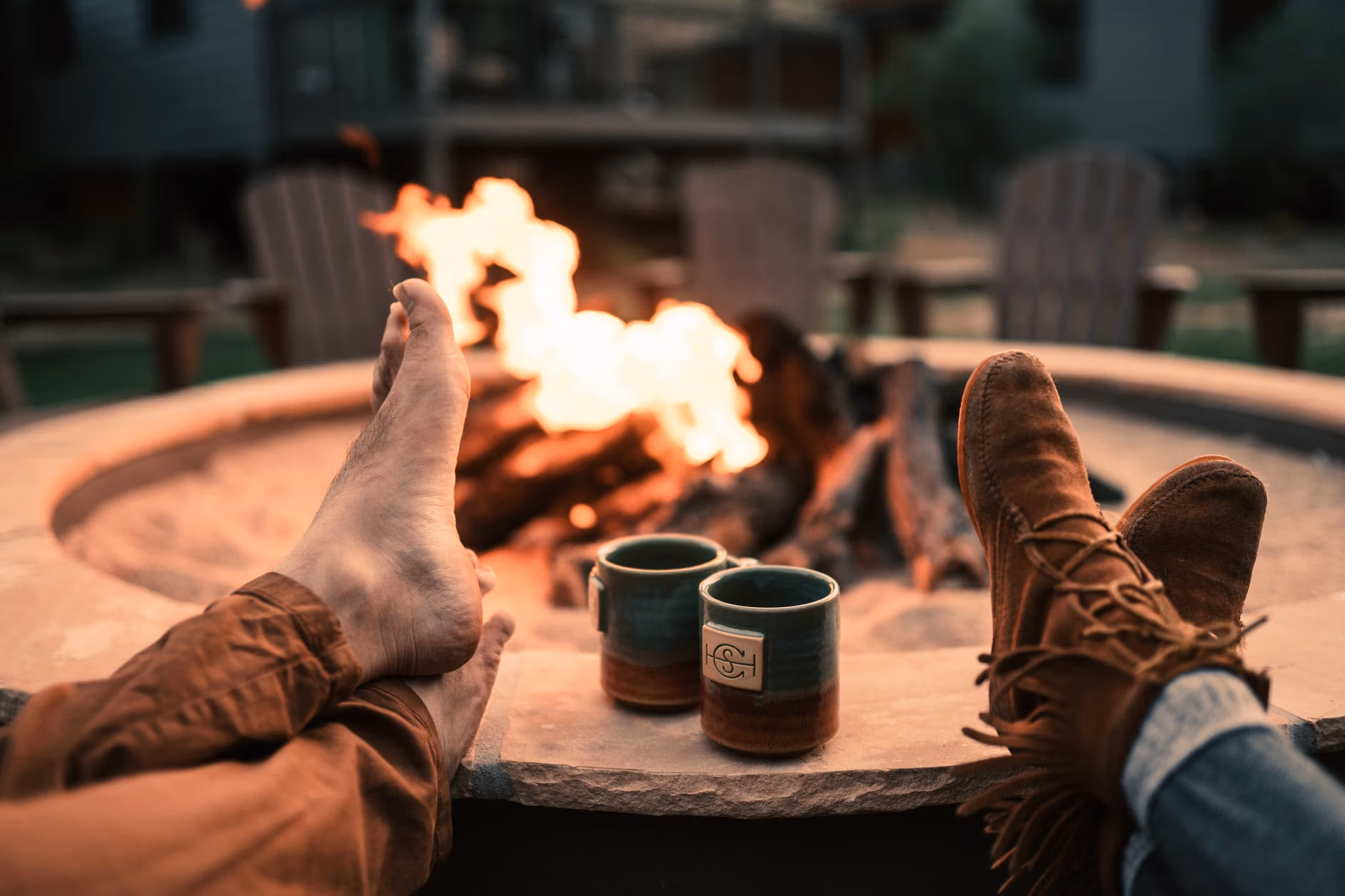 people s feet near mugs